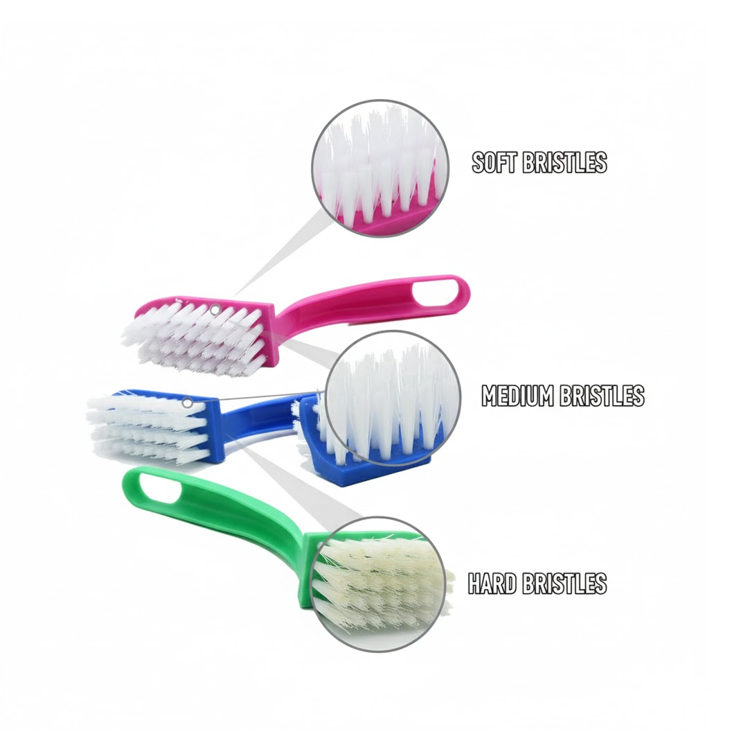 Velvet Wipe kitchen cleaning brushes neatly hanging for storage.