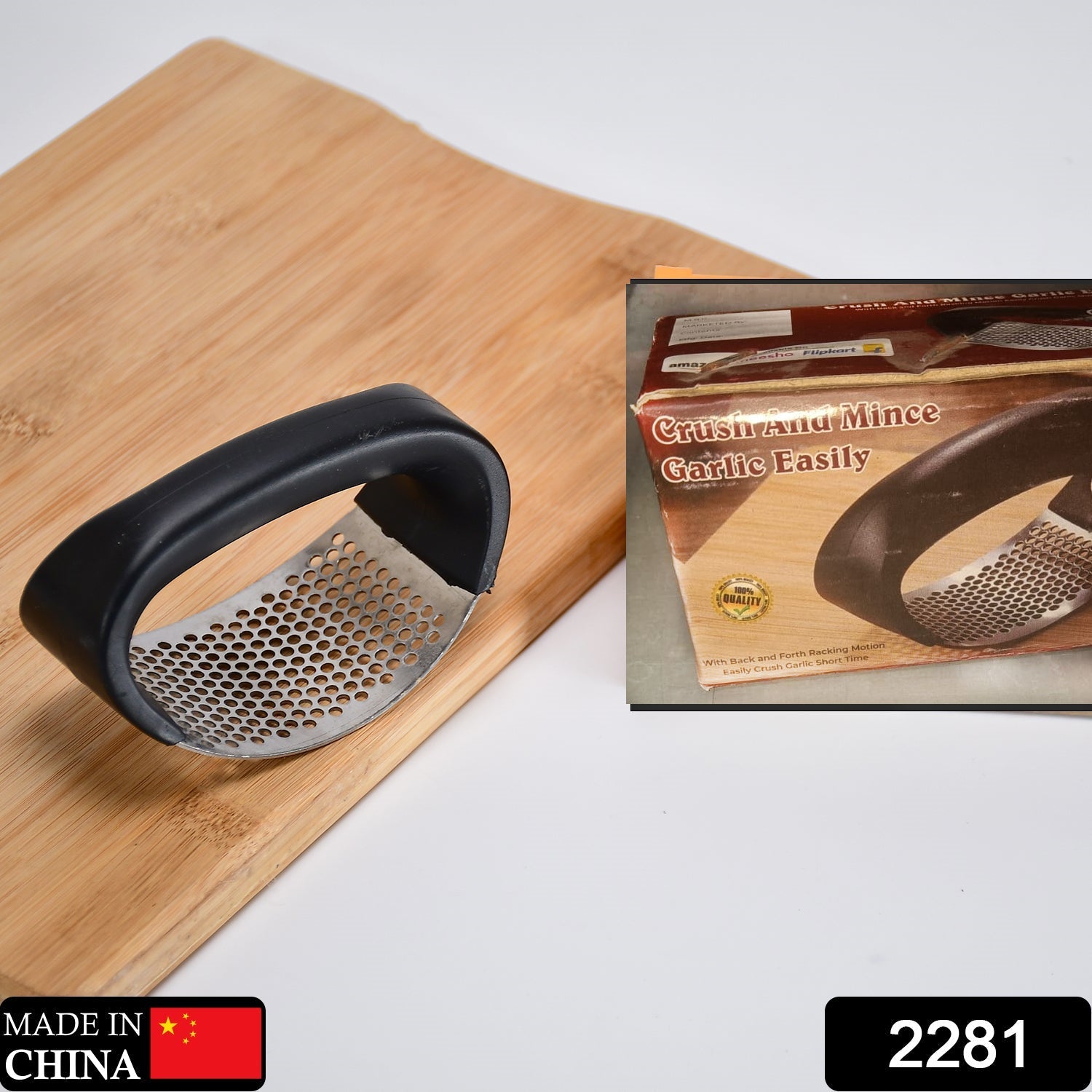 Close-up of the durable stainless steel chamber of the garlic press, ready for use.