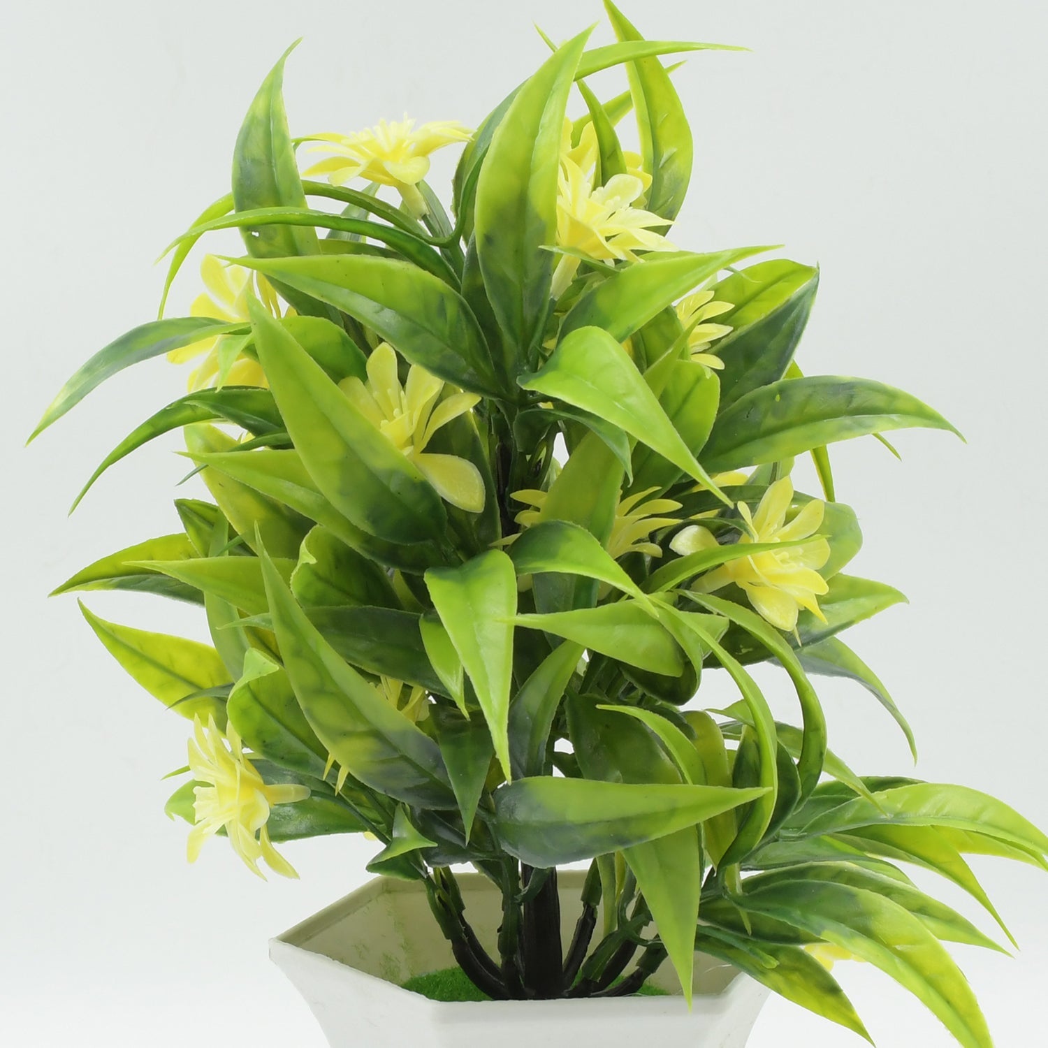 Charming artificial plant with yellow flowers, perfect for office desk decor.