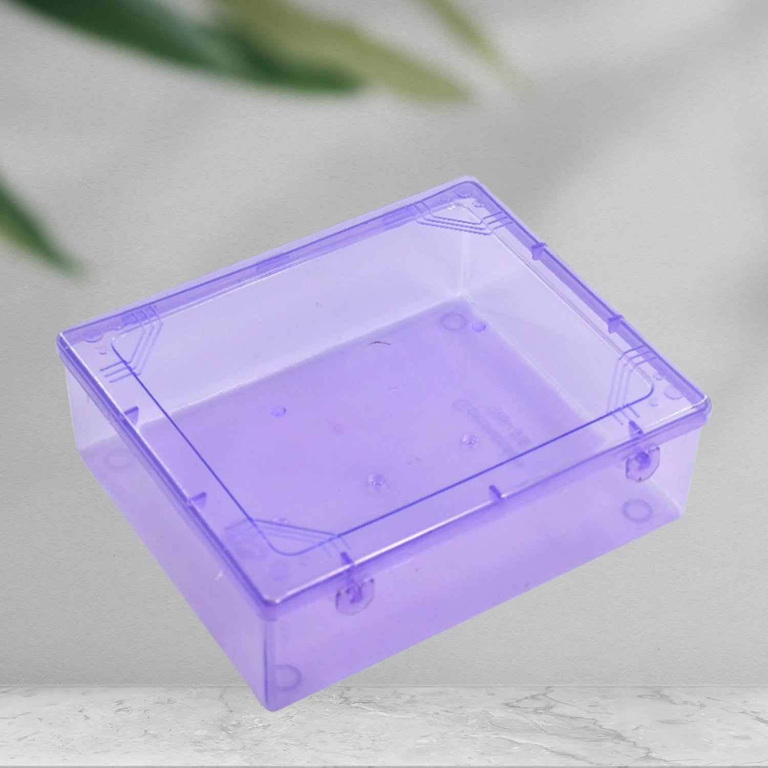 Clear plastic storage container with a blue lid, empty and ready for use.