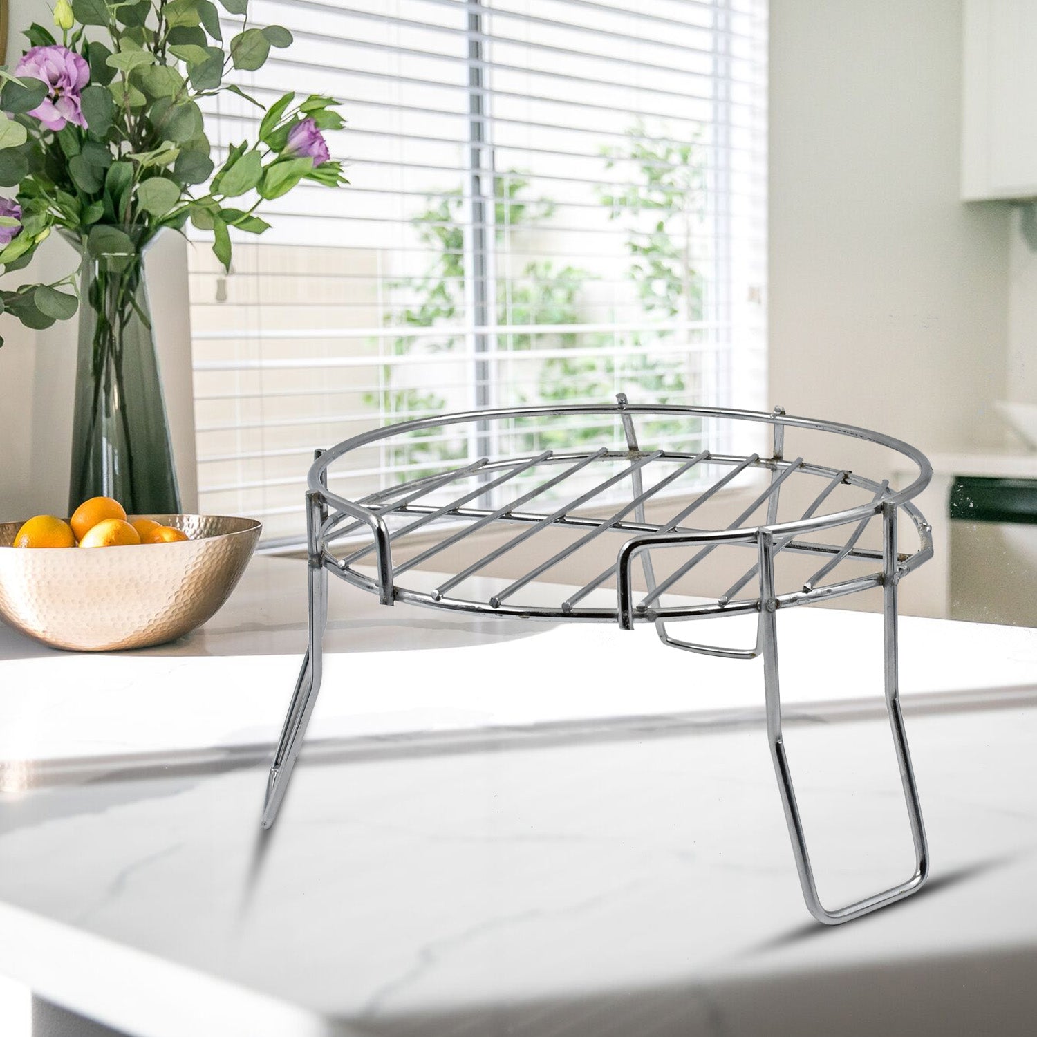 Stylish Stainless Steel Pot Stand, ideal for elevating home and garden aesthetics.