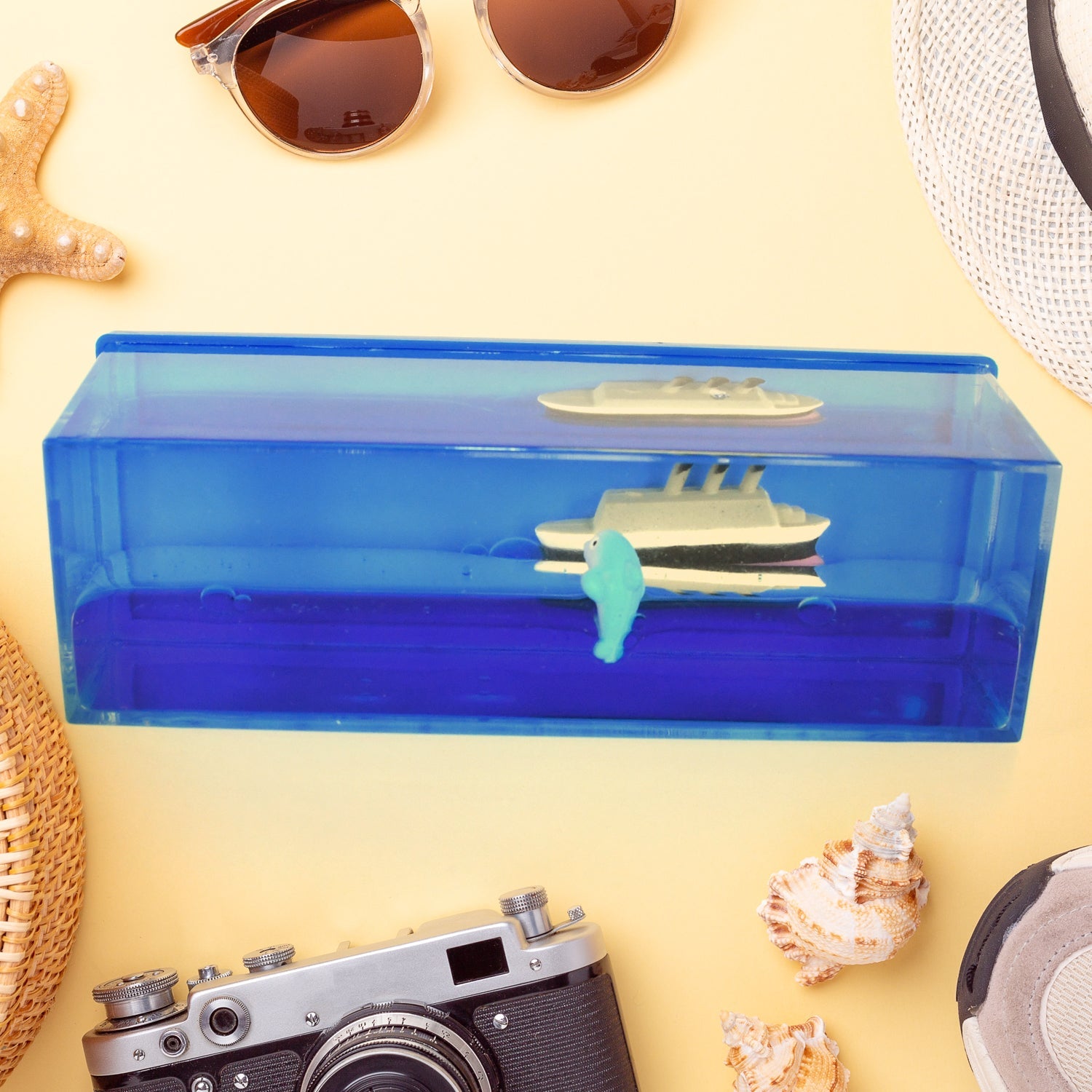 Floating Water Cruiser Ship Ornament displayed on a car dashboard.