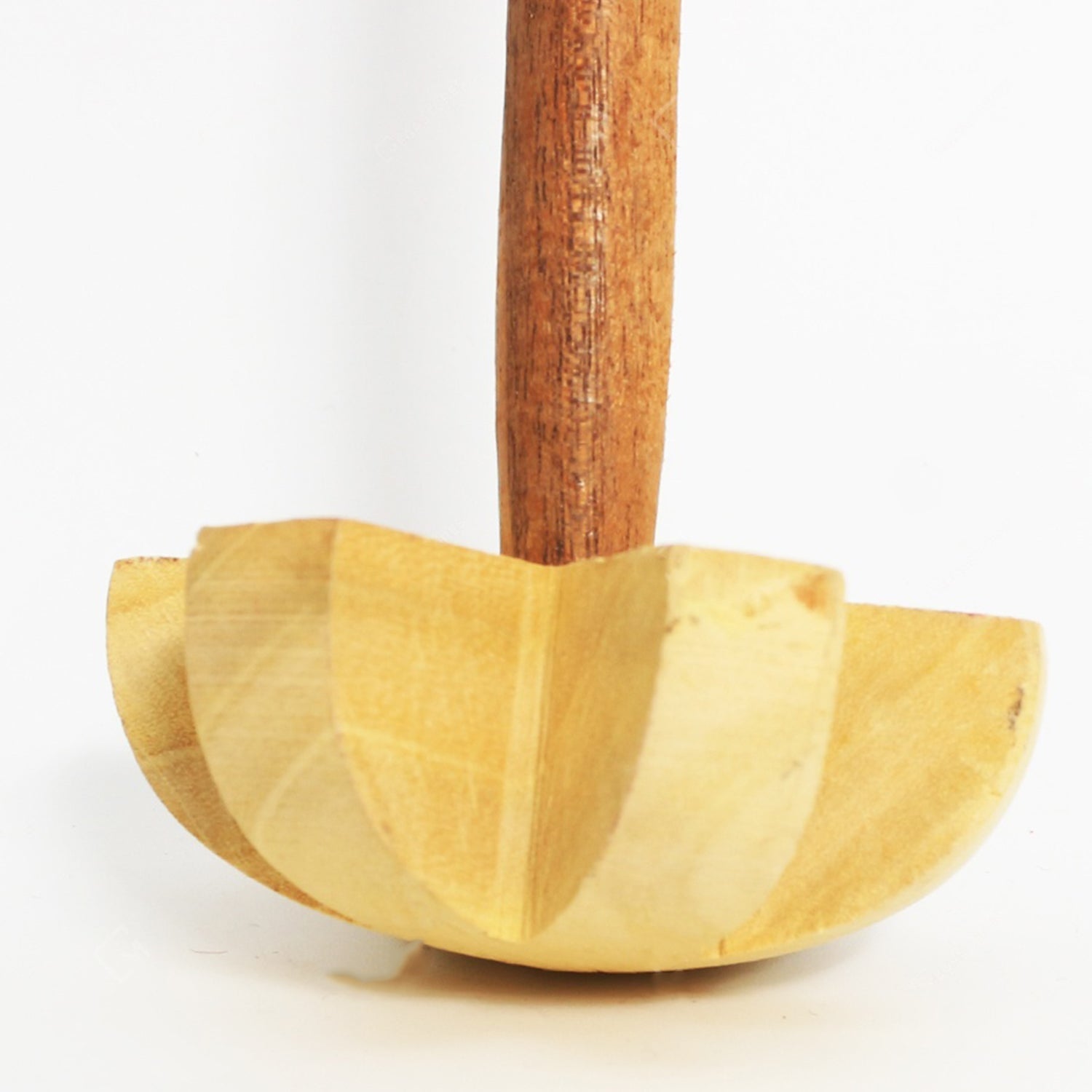 Dabster wooden blender for efficient food preparation in an Indian kitchen.