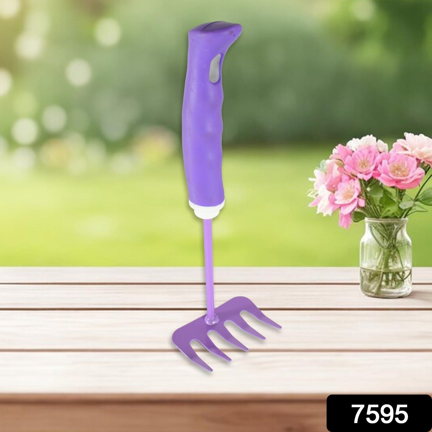 Hand fork for weeding and loosening soil, part of the essential garden tool kit.