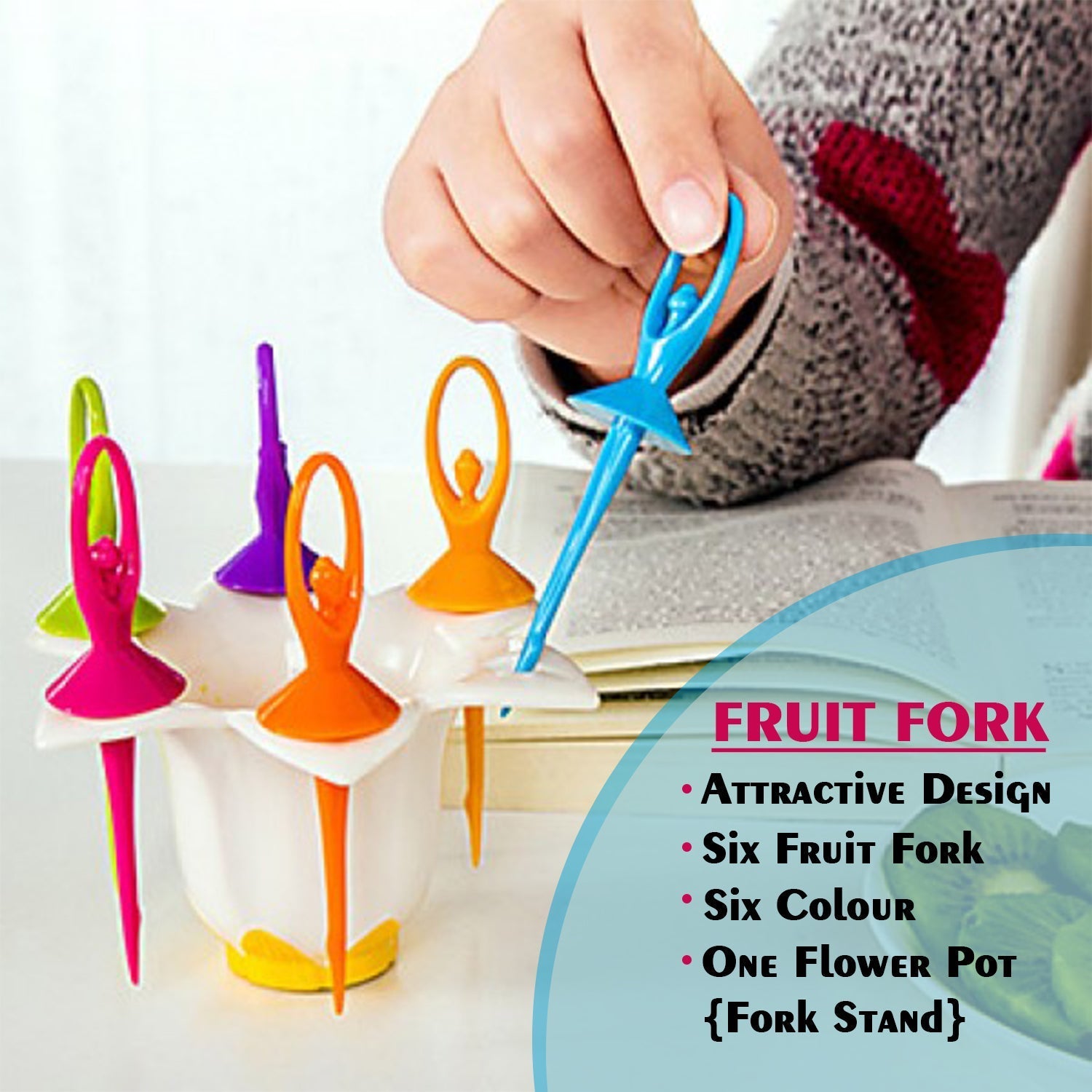 Overhead view of the Jiaqi fruit fork set, neatly arranged on its unique dancing doll stand.