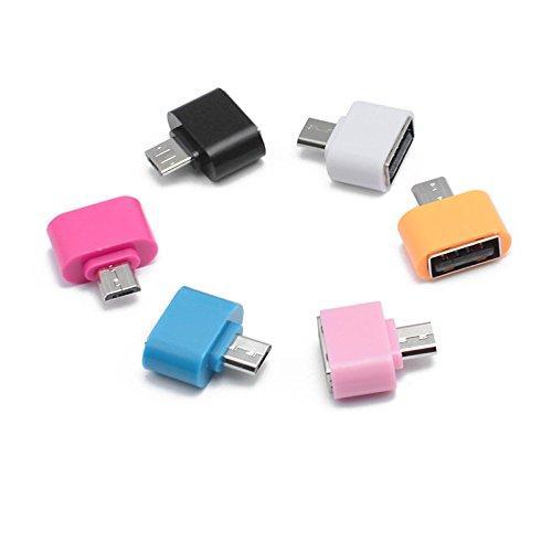 OTG adapter connected to an Android tablet, demonstrating USB flash drive compatibility.