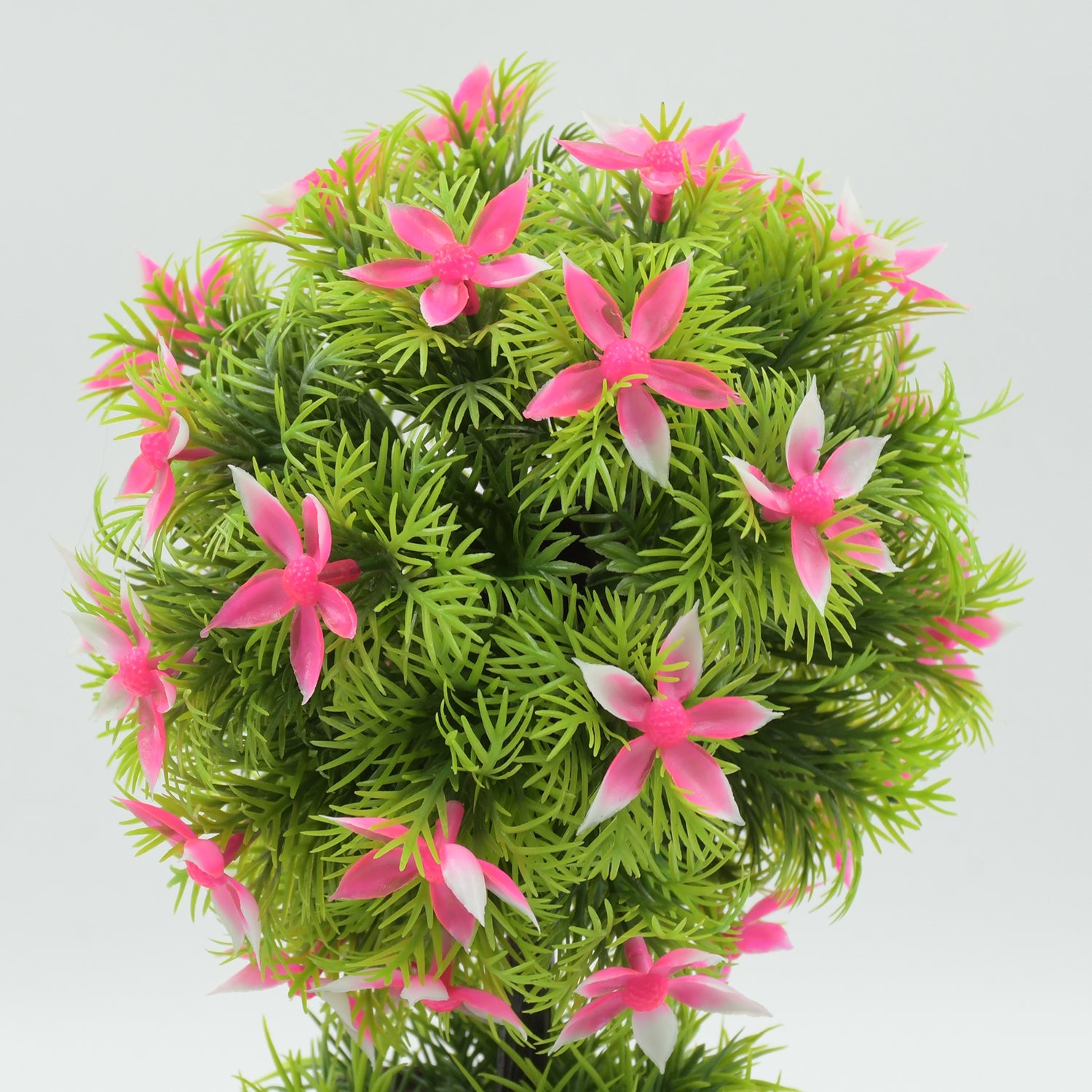 Compact artificial flower plant perfect for office desk decoration.