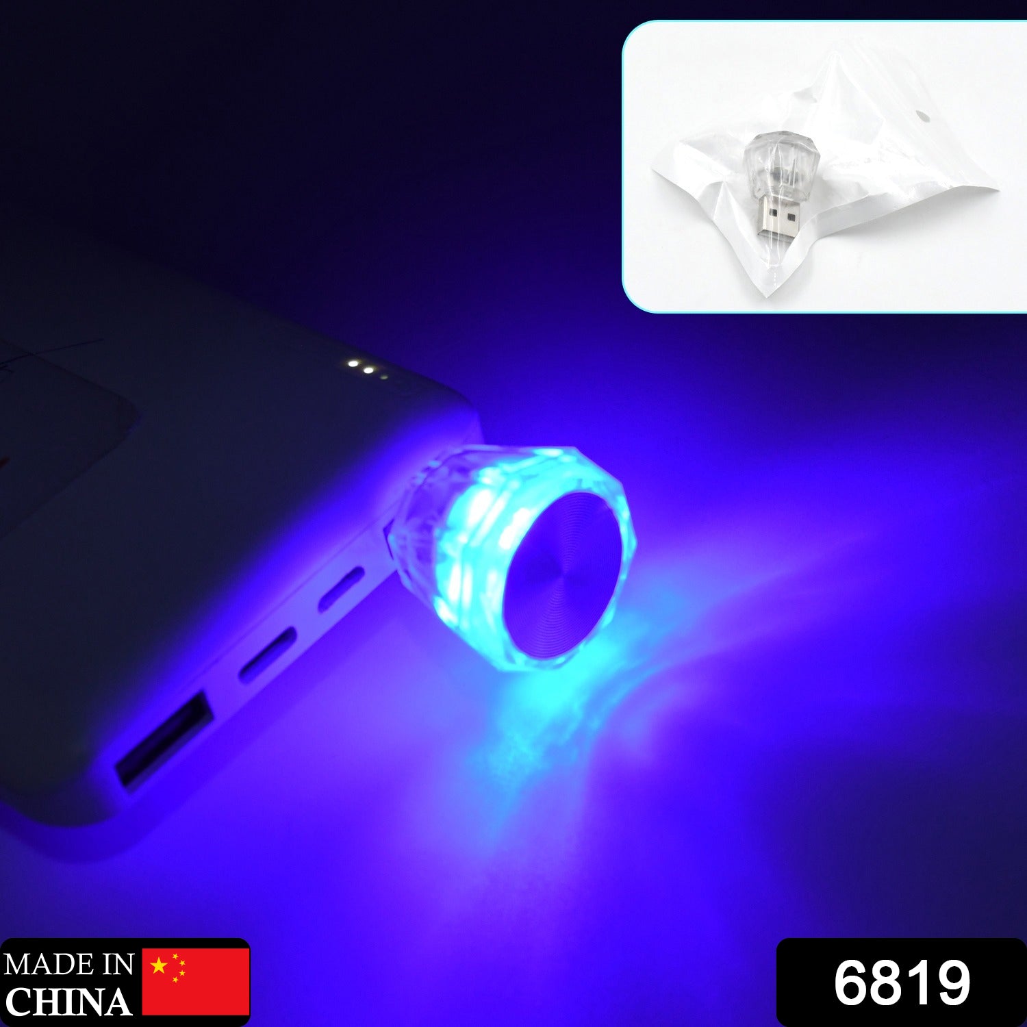 A vibrant USB car interior light in diamond shape, plugged into a car's console.
