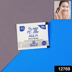 Close-up of aqua face wash sachets designed for oil control and travel use.