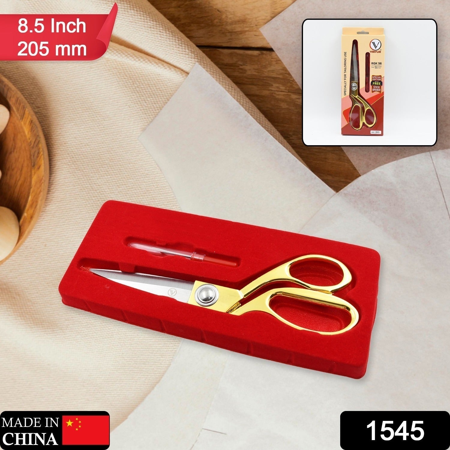 Close-up of golden handle tailoring scissors for fabric.