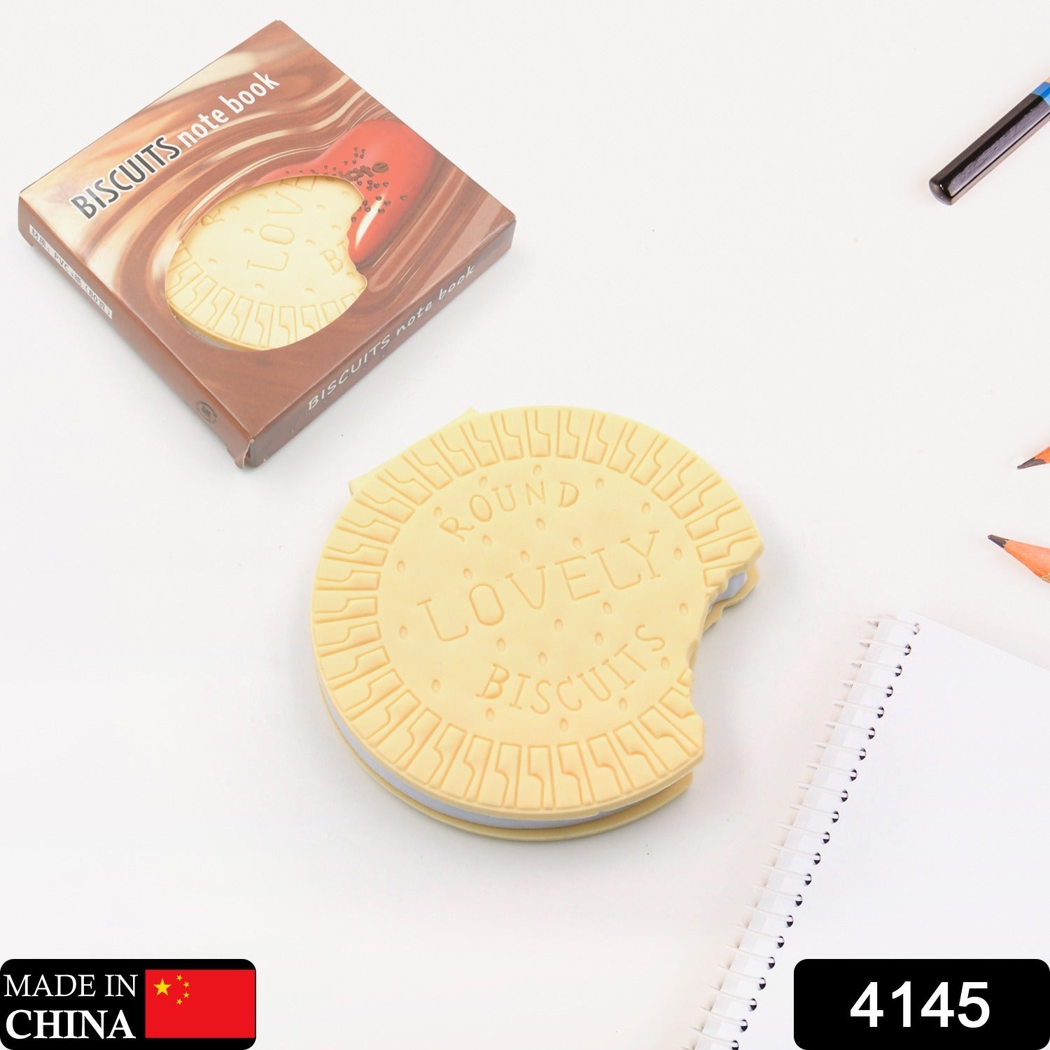 The unique biscuit notebook from Papezo displayed open with a pen, ready for writing.