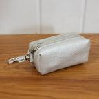 Travel-ready mini key pouch with zipper closure and clip