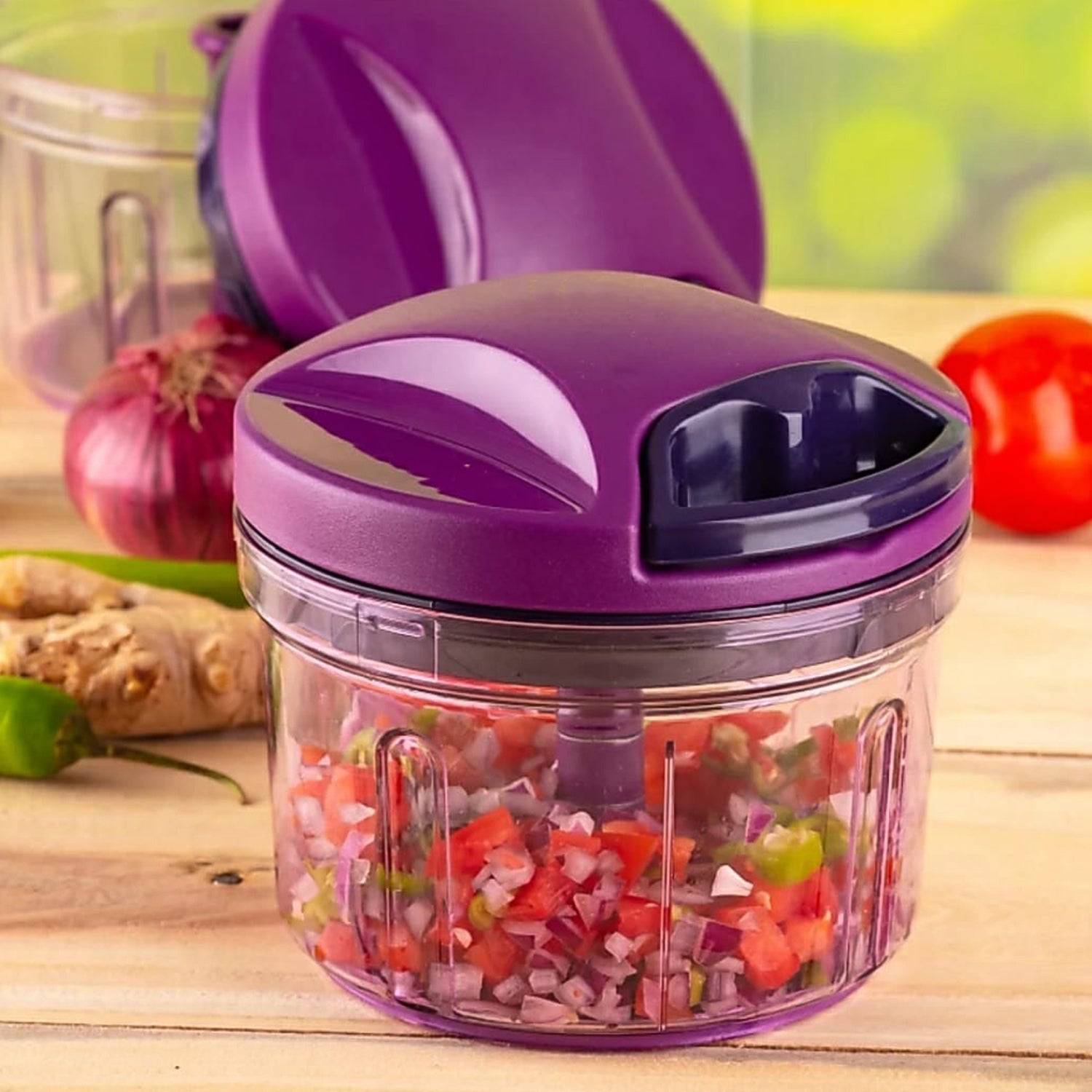 Compact kitchen vegetable chopper with pull string cutter