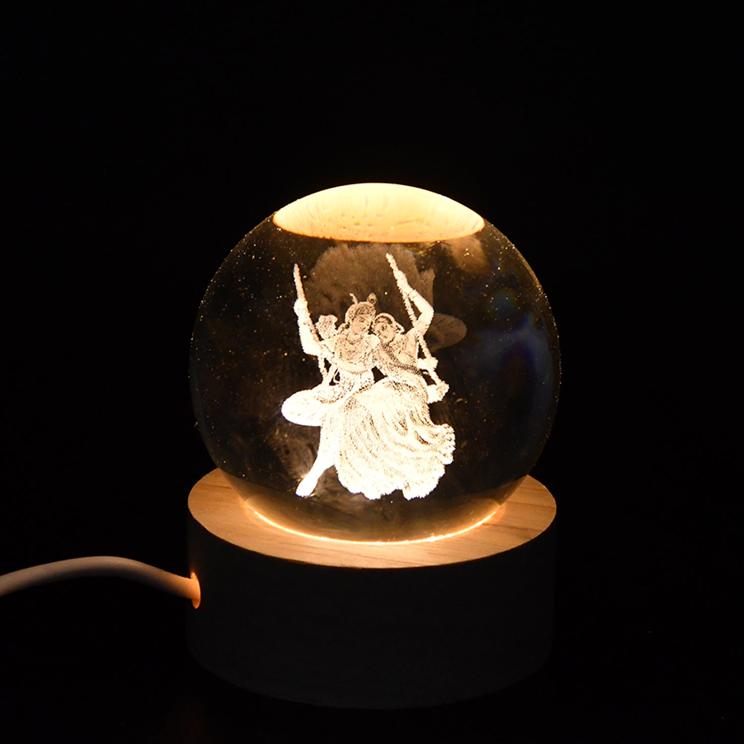 A glowing Radha Krishna 3D Crystal Ball Lamp, perfect for spiritual home decor.