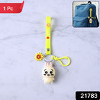 Cute cartoon bunny silicone keychain attached to a backpack strap