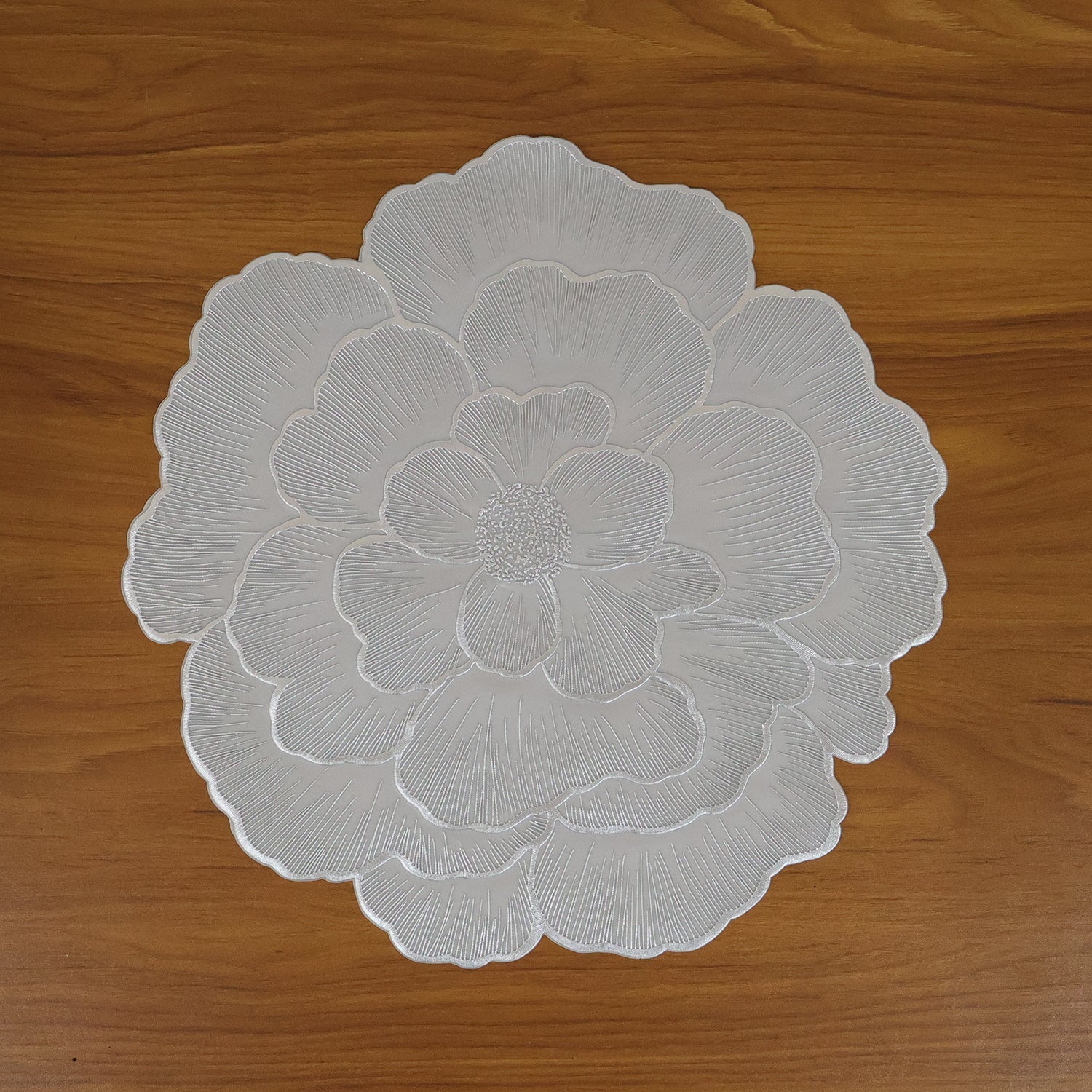 Live setting featuring floral PVC table mat