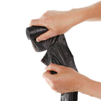 Stack of rolled disposable eco-friendly garbage bags.