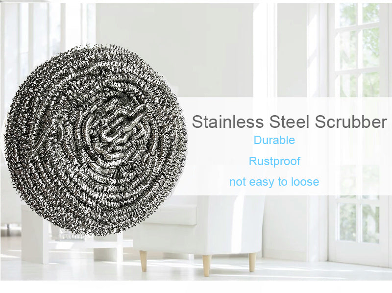Round stainless steel scrubber shown in use, effortlessly removing tough stains from cookware.