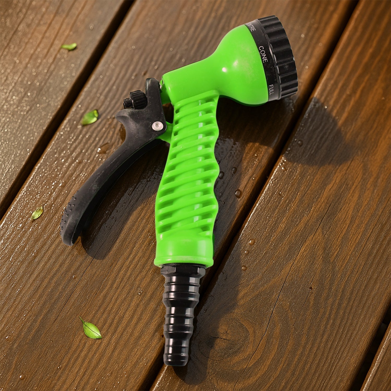 Close-up of trigger and continuous-spray latch on garden hose nozzle