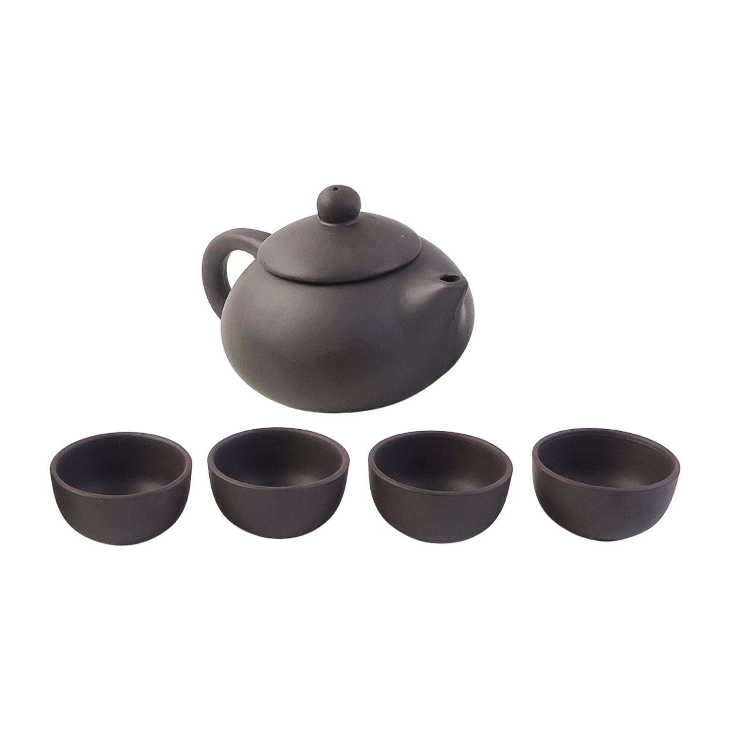 Close-up of the textured matte black ceramic tea set showcasing elegant finish