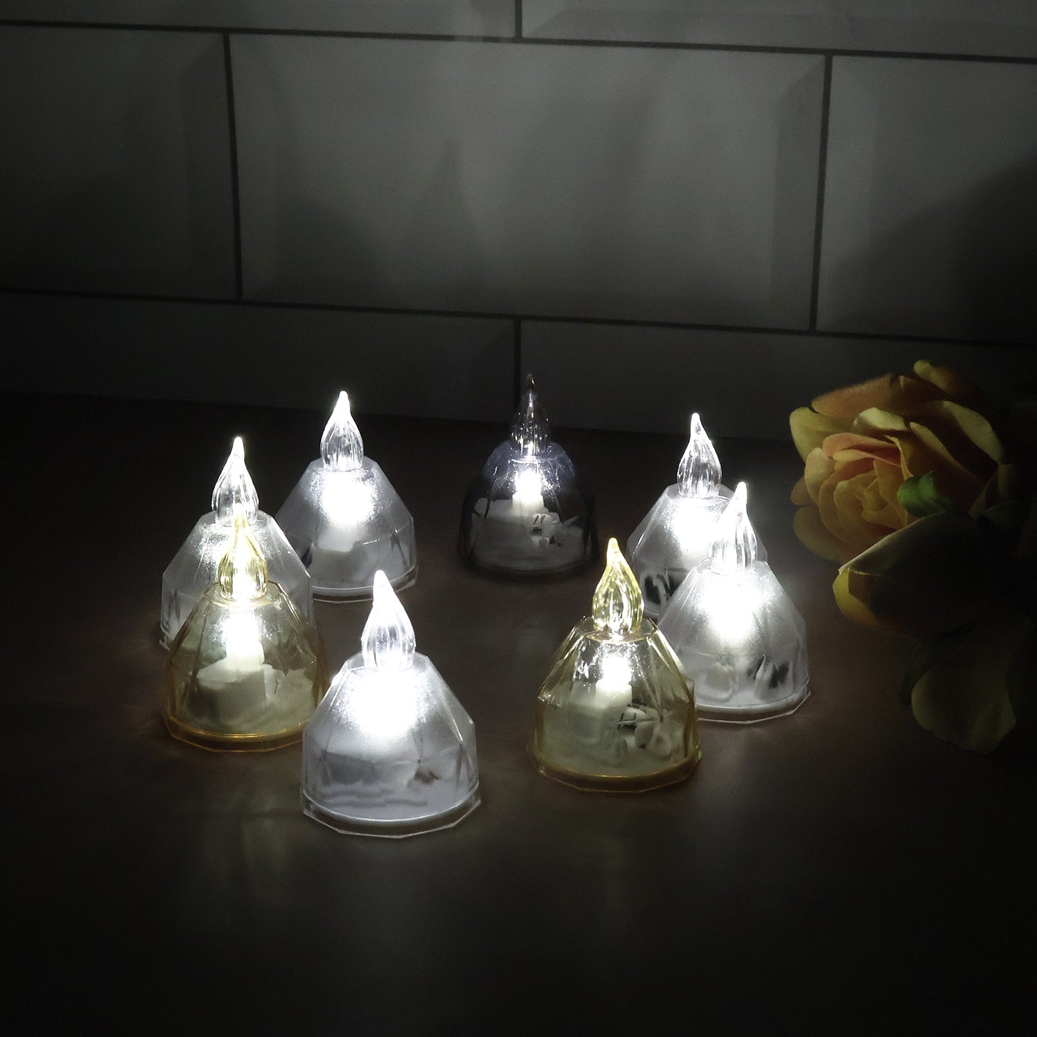 Close-up of LED decorative diyas with warm glowing light for pooja