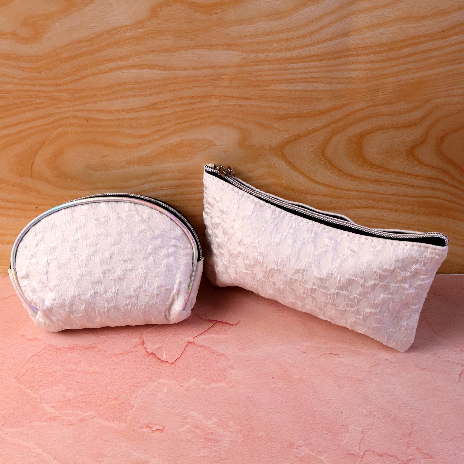 Compact cosmetic bags included in the 3-in-1 makeup organizer set