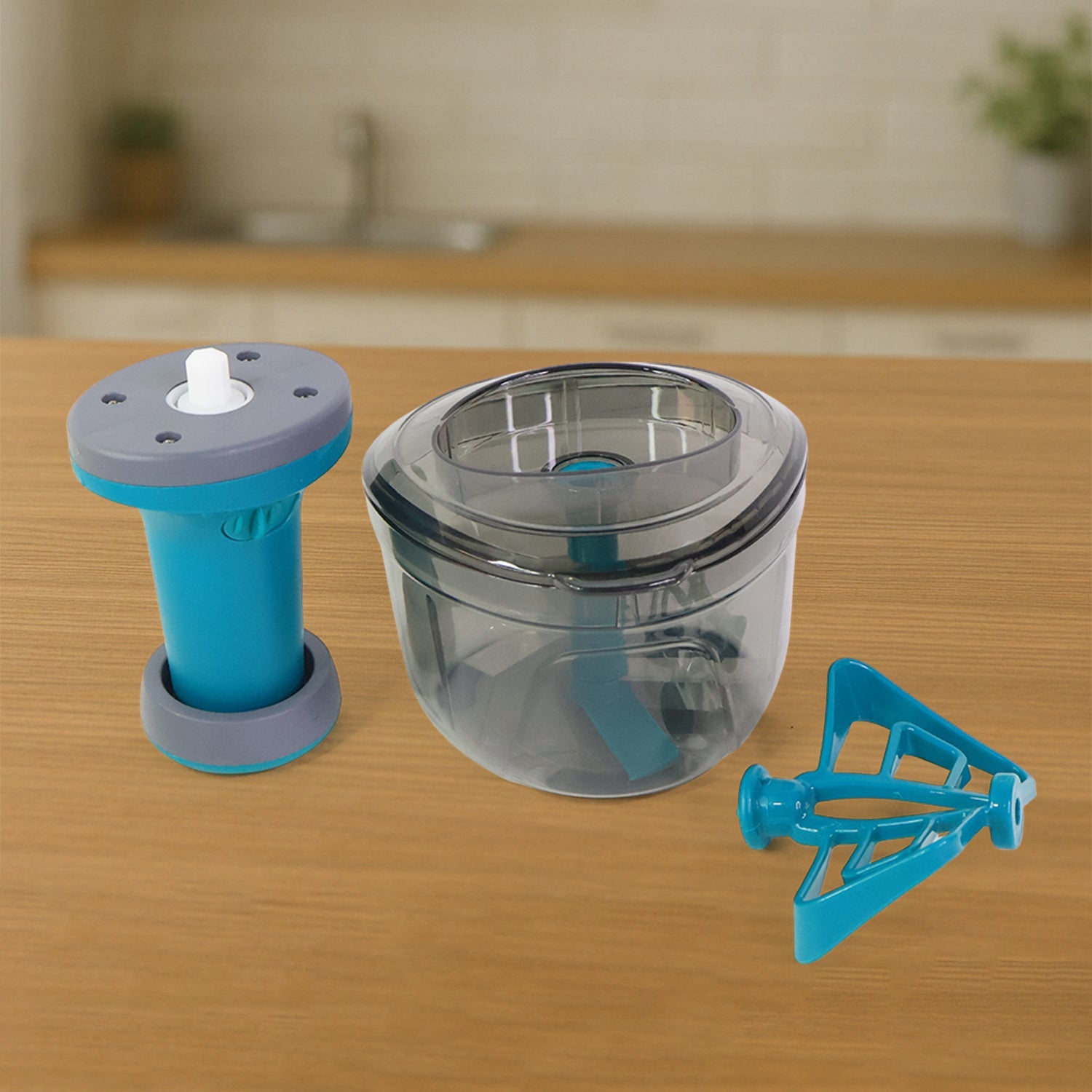 User demonstrating push-down mechanism on manual vegetable chopper.