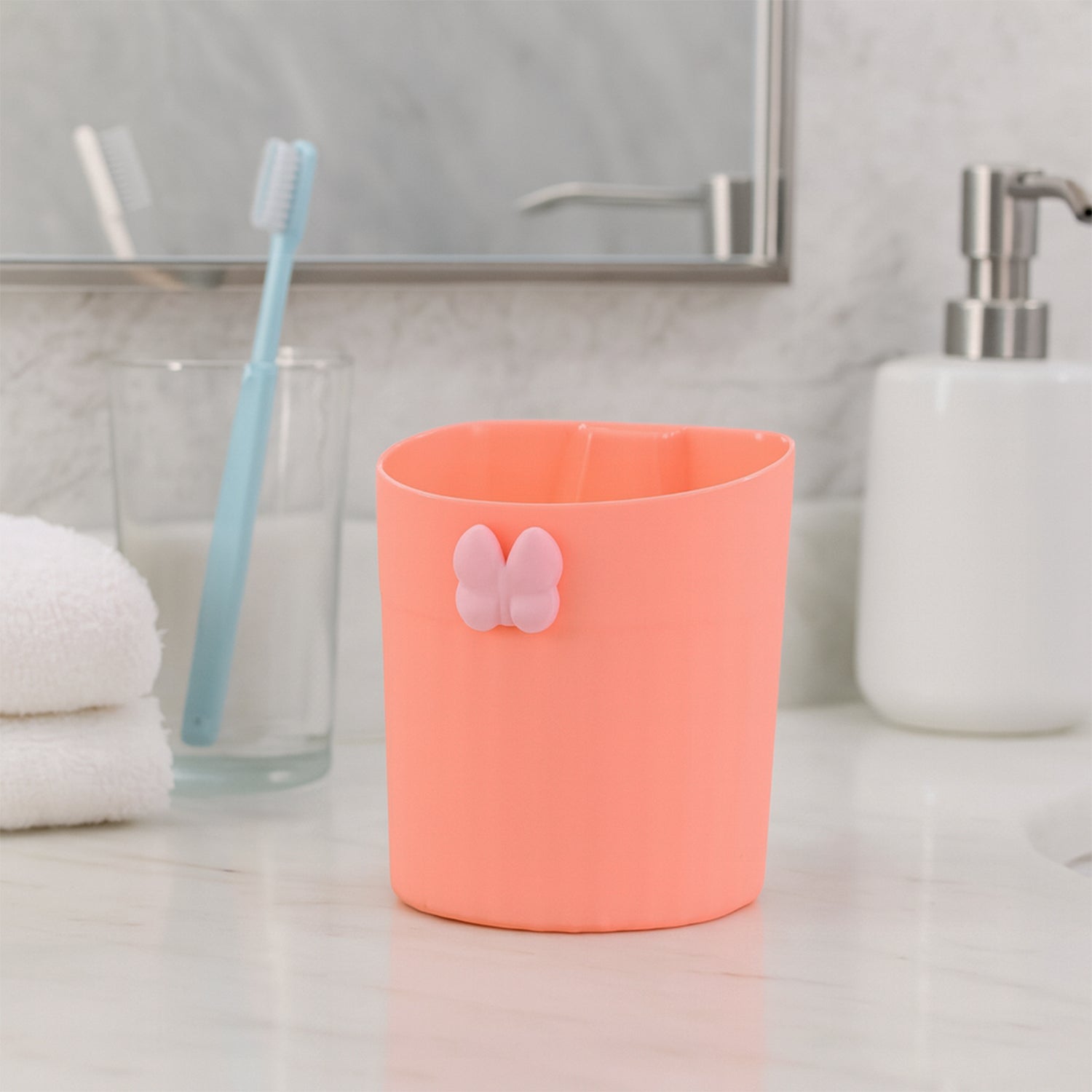 Adhesive-backed toothbrush holder mounted on bathroom wall displaying no-drill installation