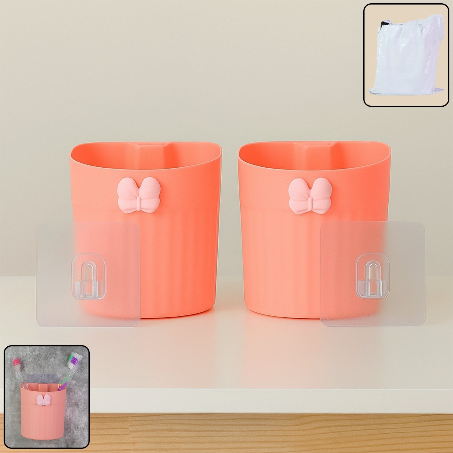 Wall-mounted toothbrush holder with butterfly design holding multiple toothbrushes