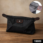 Waterproof multipurpose travel organizer pouch in black with brown detailing
