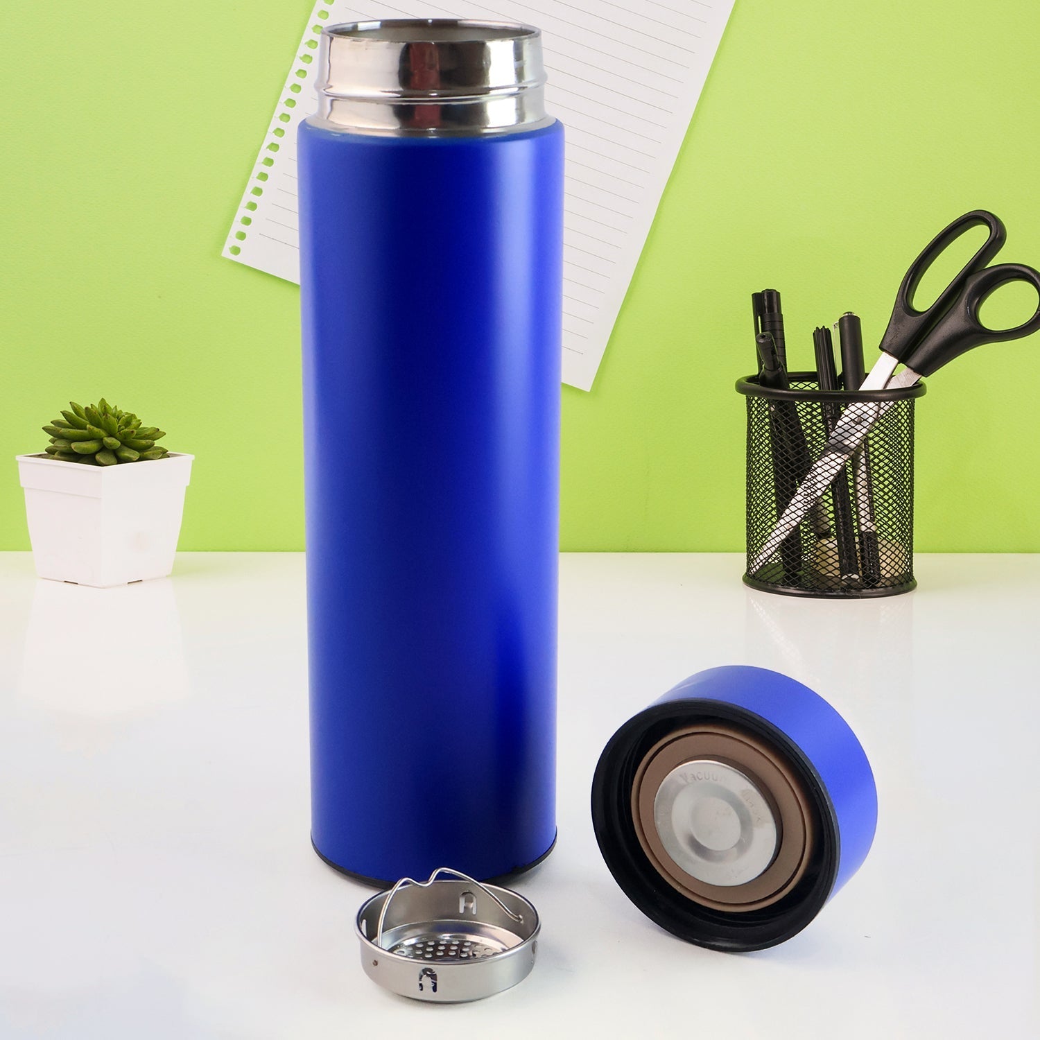 Blue vacuum insulated water bottle ideal for travel and outdoor use