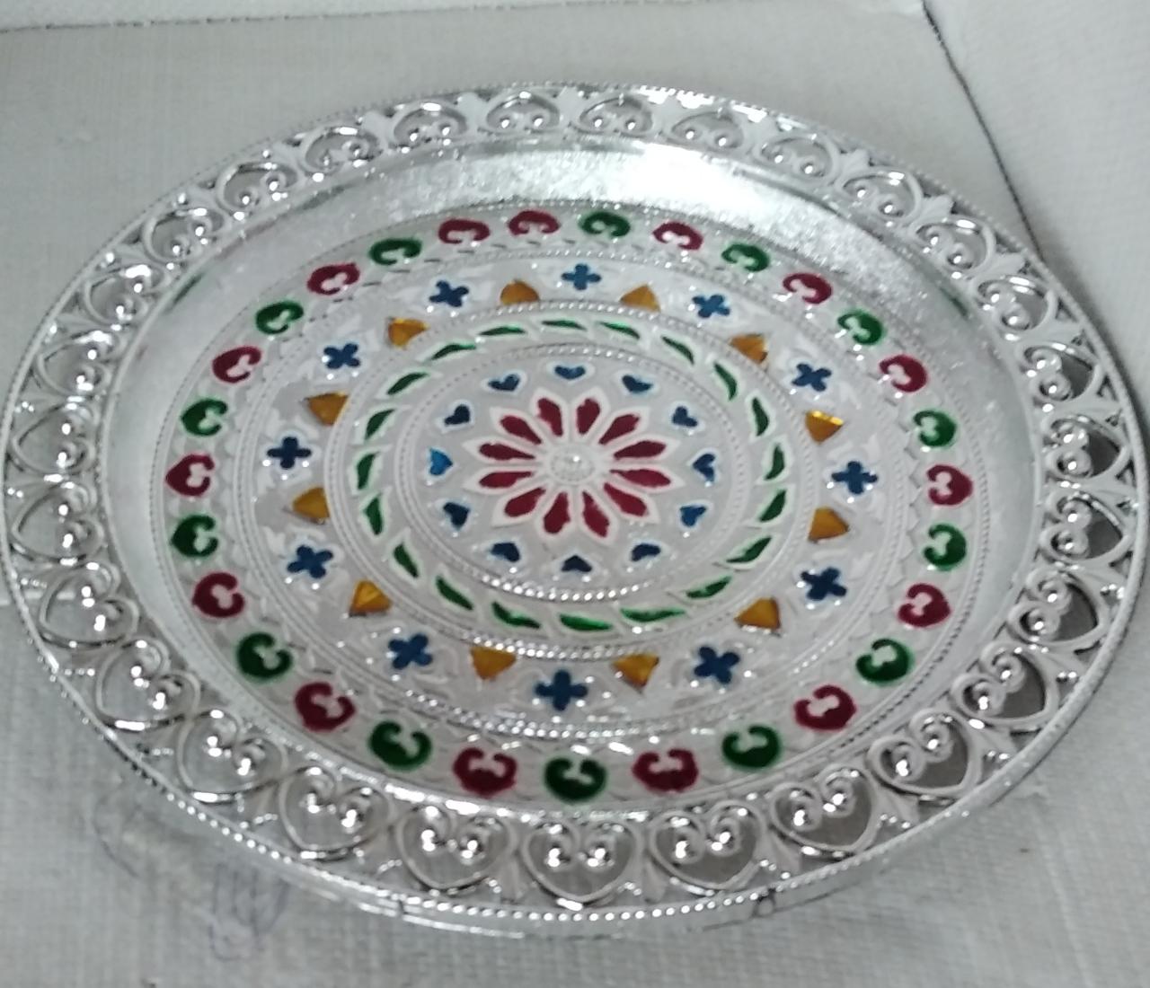 Elegant silver plated pooja thali, perfect for Indian traditional worship and ceremonies.
