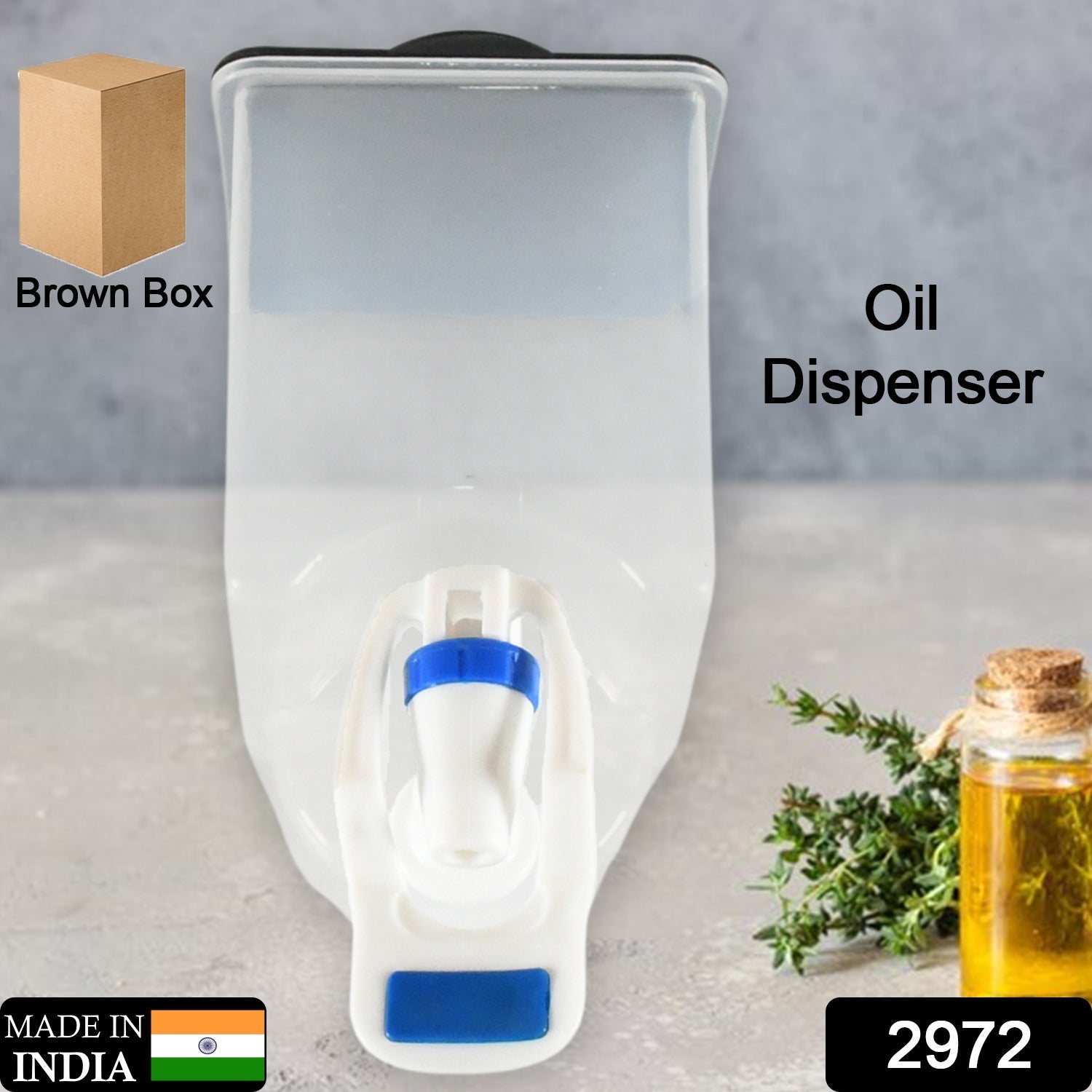 Close-up of the no-drip spout on the wall mounted oil dispenser for precise pouring.