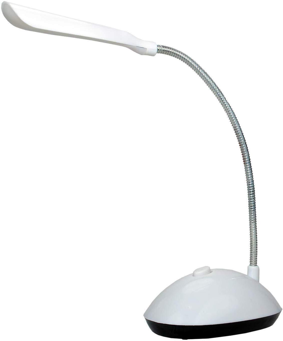 Portable LED reading light illuminating a book and workspace.