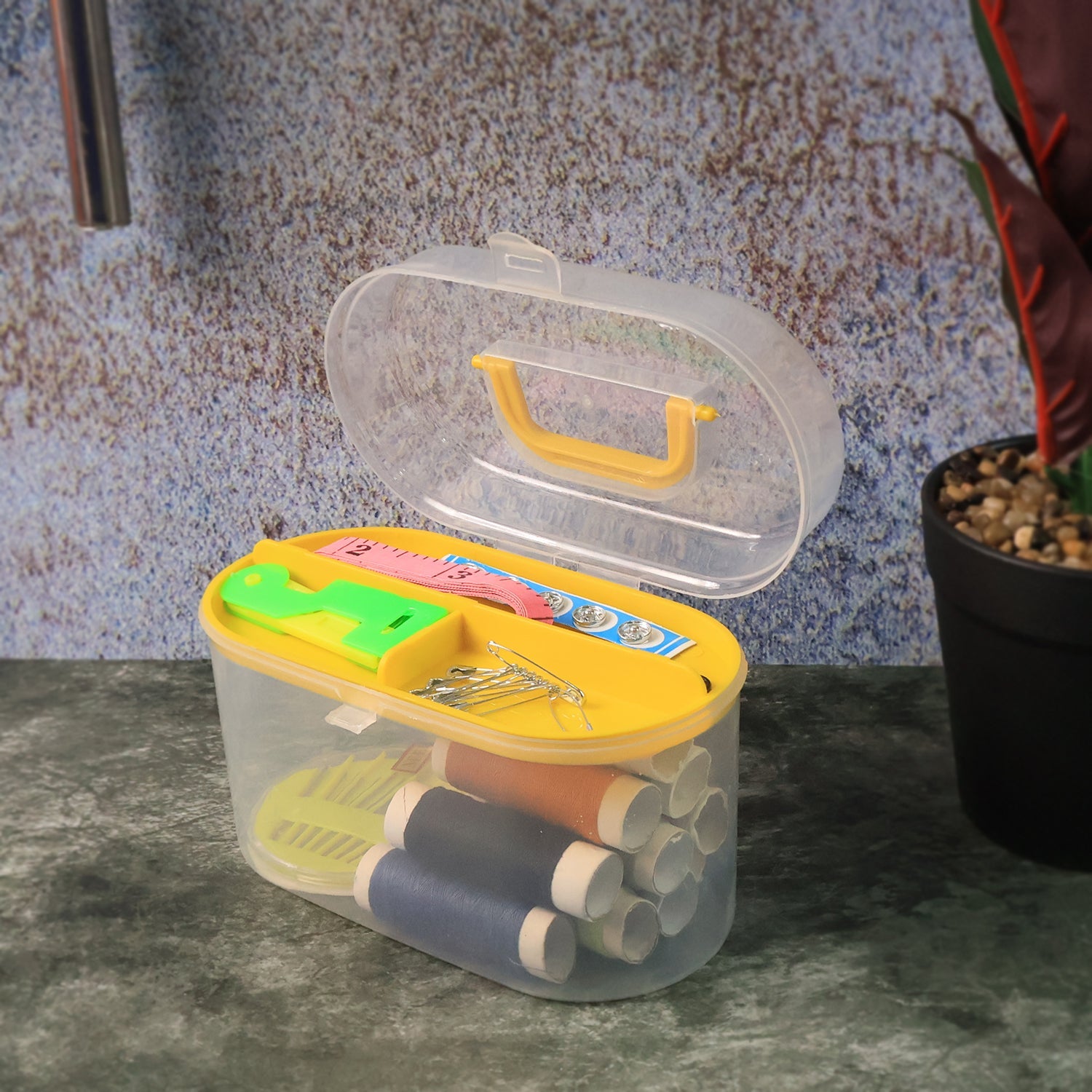 Compact travel sewing kit easily fits into a handbag, perfect for on-the-go mending.