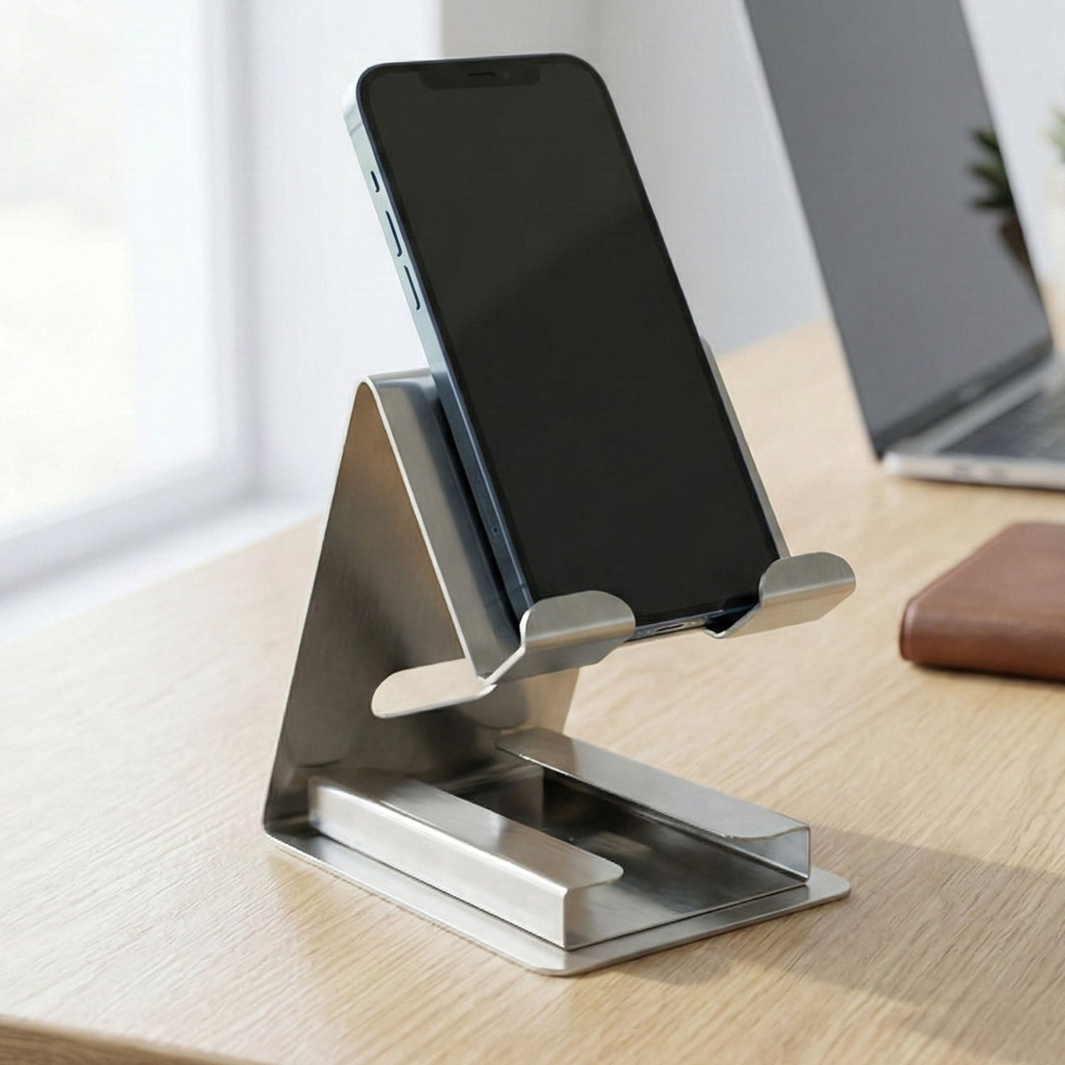 Premium mobile phone stand placed on table with secure grip