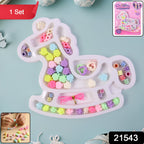 Close-up of craft set beads including alphabet and cute shapes for kids jewellery making