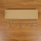 Compact wall mounted hook rack for small spaces