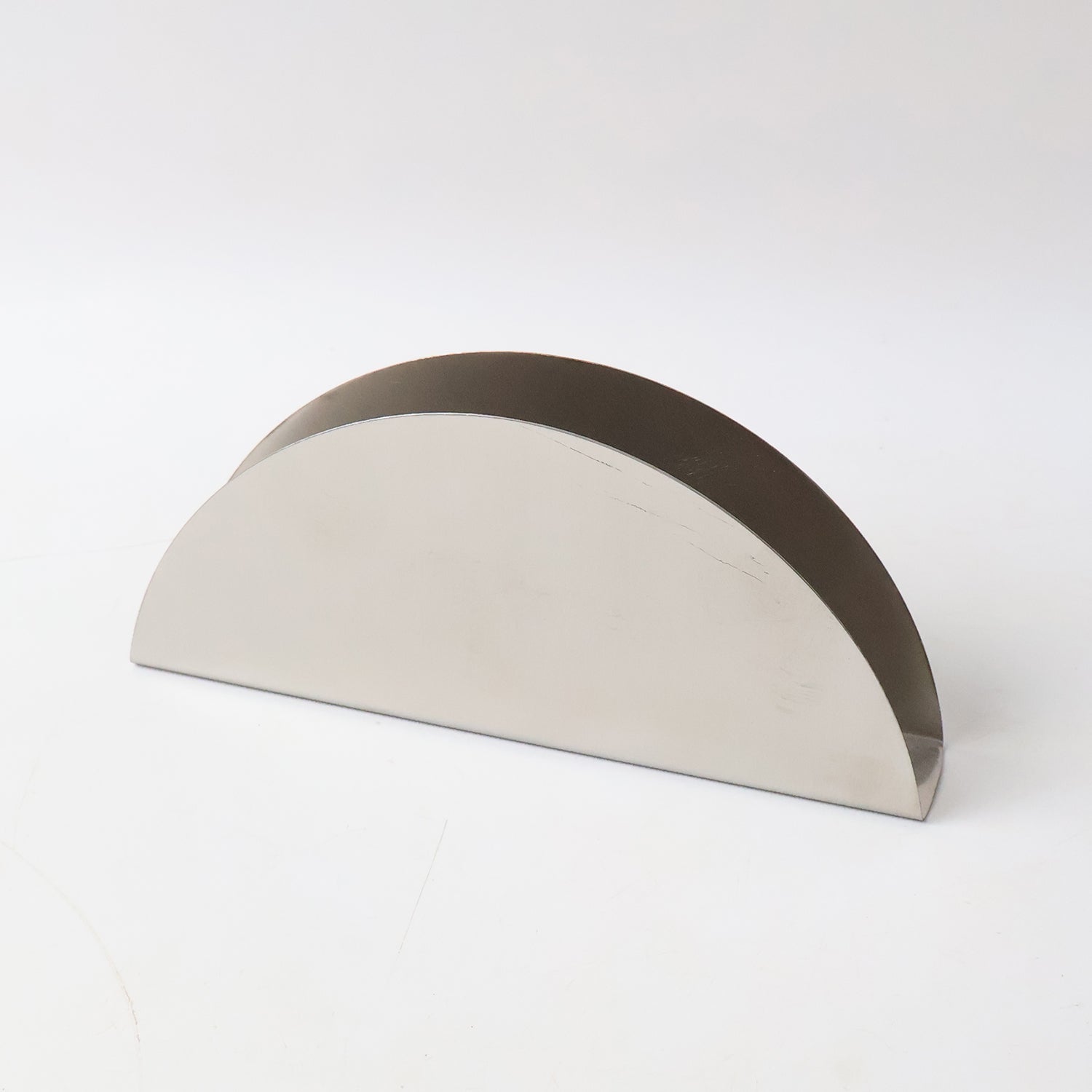 Sleek metal napkin dispenser made of stainless steel